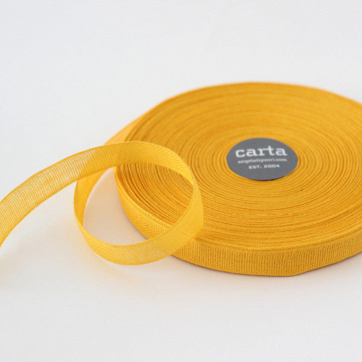 Loose weave cotton ribbon.Ribbon size: 1/2" width = 15 mm. 48 colors, curated by Angela Liguori for Studio Carta.100% cotton fiber  Made in Italy, designed, packaged and distributed in USA..