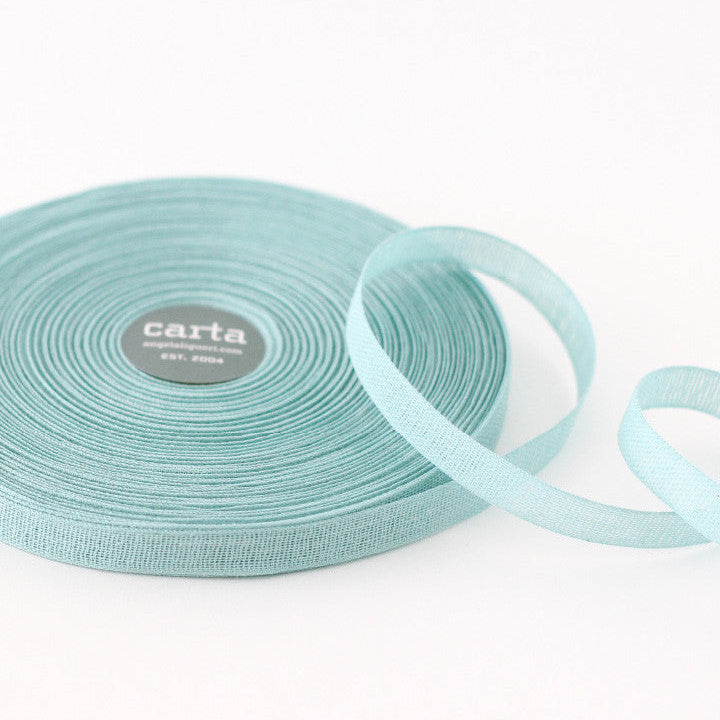 Loose weave cotton ribbon.Ribbon size: 1/2" width = 15 mm. 48 colors, curated by Angela Liguori for Studio Carta.100% cotton fiber  Made in Italy, designed, packaged and distributed in USA..