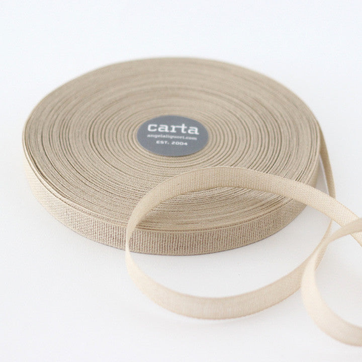 Loose weave cotton ribbon.Ribbon size: 1/2" width = 15 mm. 48 colors, curated by Angela Liguori for Studio Carta.100% cotton fiber  Made in Italy, designed, packaged and distributed in USA..