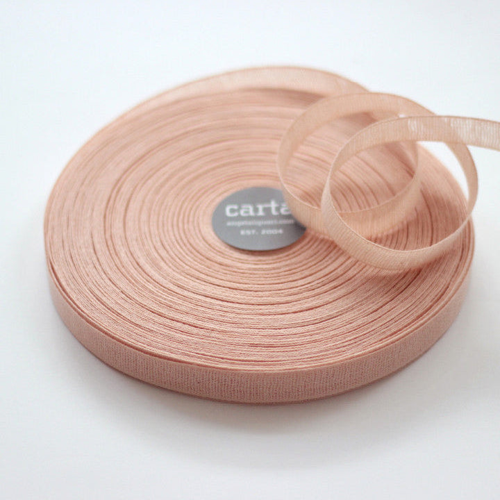 Loose weave cotton ribbon.Ribbon size: 1/2" width = 15 mm. 48 colors, curated by Angela Liguori for Studio Carta.100% cotton fiber  Made in Italy, designed, packaged and distributed in USA..